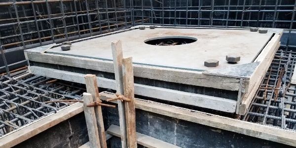 Seismic isolator lower member formwork installation