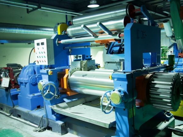 Open mill for seismic isolator production